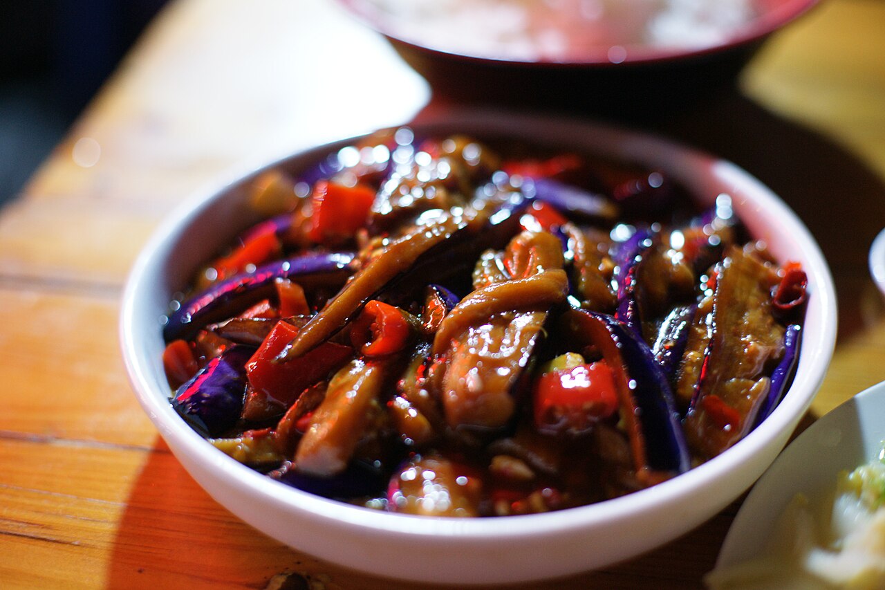 Sichuan Fish Fragrant Eggplant Recipe: Texture and Sauce Timing 1 sichuan fish fragrant eggplant recipe opening image showing eggplant in a clear landscape context