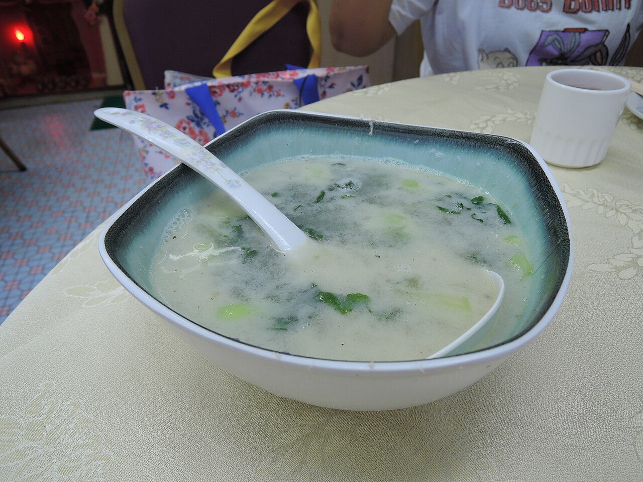 sichuan pickled vegetable fish recipe opening scene showing Chinese fish soup