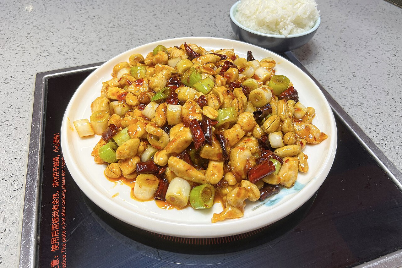 Sichuan stir fry mise en place with vegetables, aromatics, chilies, and sauce