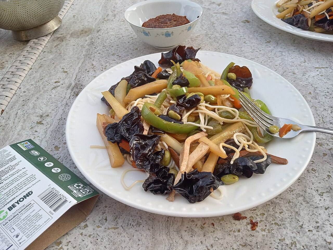 wok stage for blooming aromatics and moving vegetables in a Sichuan stir fry