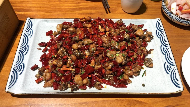 Sichuan Peppercorn Chicken Recipe: Heat, Aroma, and Stir-Fry Steps 1 Dry-style chicken with dried chilies