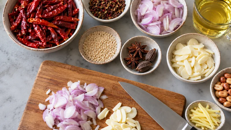 Sichuan Chili Crisp Recipe: Oil Temperature, Aromatics, and Storage 1 Chili-crisp ingredients with star anise, cardamom, peanuts, fresh ginger, shallots and garlic; no cinnamon