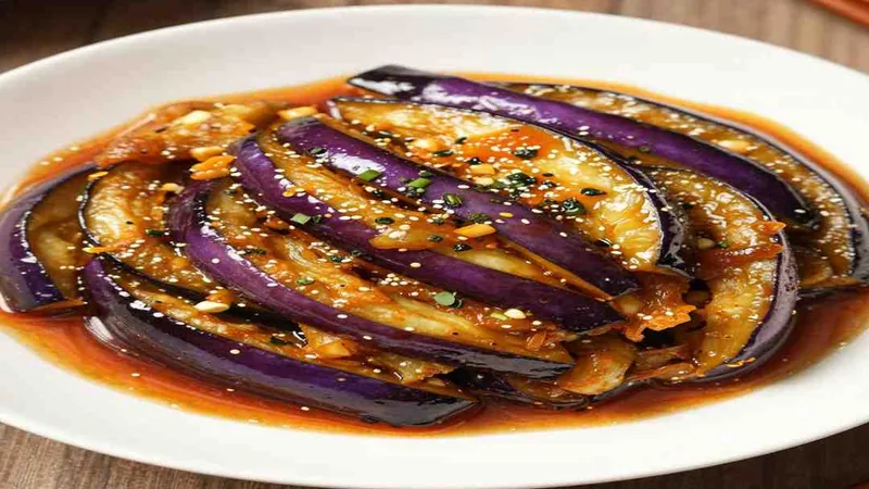 Why Your Mapo Eggplant Recipe Never Tastes Like 1 Eggplant strips in mapo-style sauce