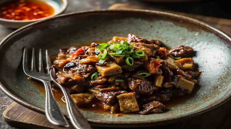 Fish-Fragrant Eggplant: Sichuan Recipe and Home Cooking Tips 1 Cooked eggplant pieces in sauce
